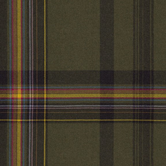 Close-up of a plaid fabric with green, red, and yellow colors.
