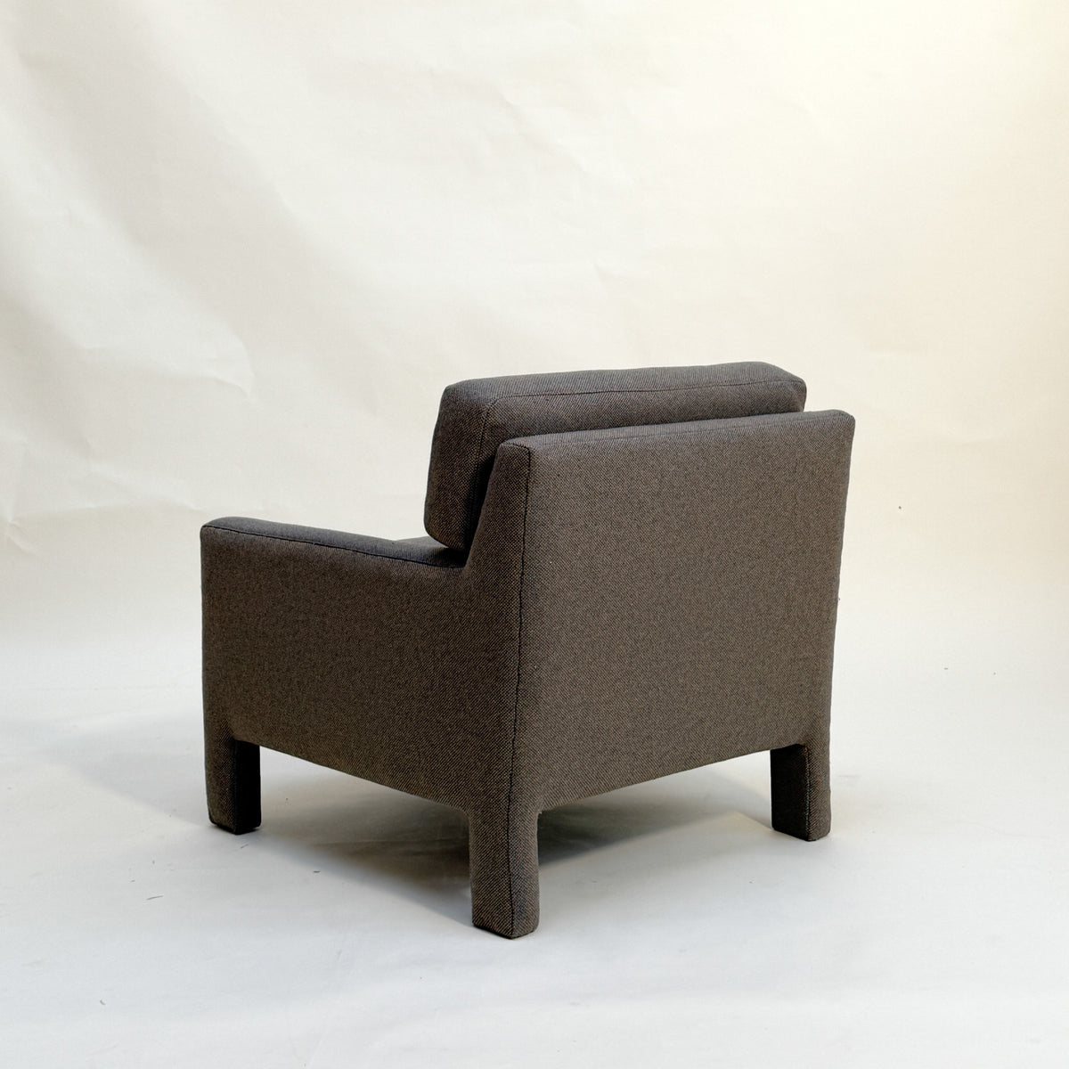 Parsons style armchair on a white background