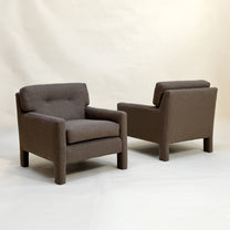 Two micro-checked Designtex fabric armchairs on a white background