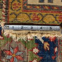 Rug with a measuring tape showing dimensions